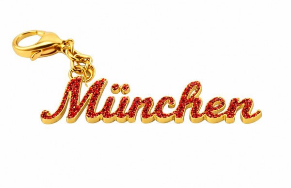 Strass Schrift "München" rot Glitzer auf gold Metall, mit Karabinerhaken