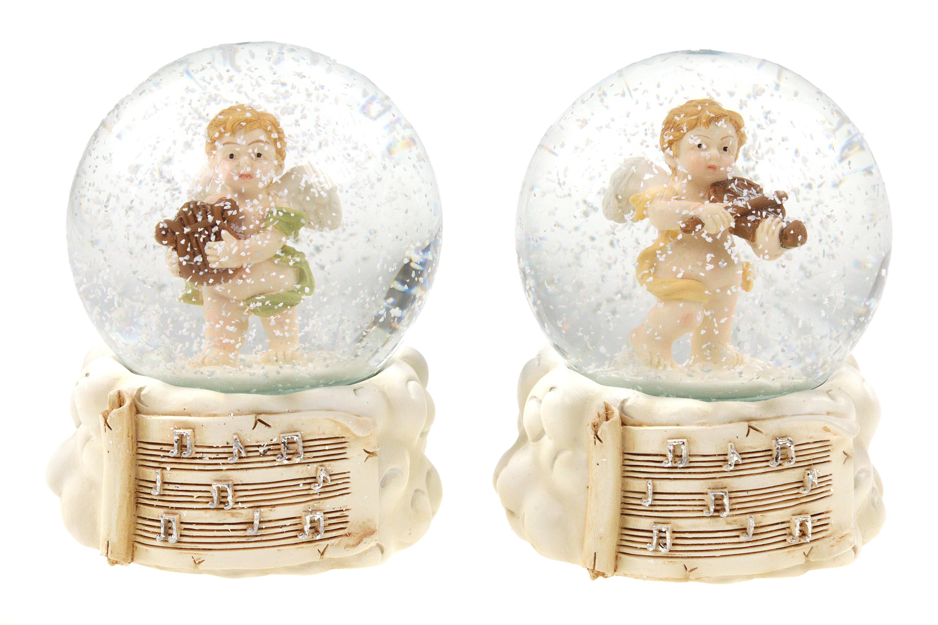 Elegantes Figuren Fr Schneekugeln Bilder